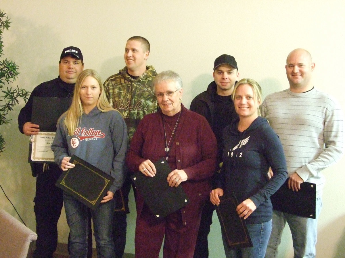 Image: Recipients of the Community Service Certificate (L-R) Back row Officers Eric Tolliver, Mike Richardson, Daniel Pitts and Shawn Martin. Bottom row Officer Shelbee Landon, Sue Lauhoff and Sgt. Tierra Mooney.