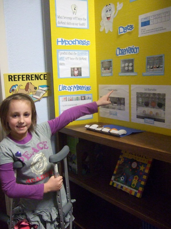 Image: Adyson Mathers (2nd grade) took first place for her science project – what beverage will stain your teeth the darkest?