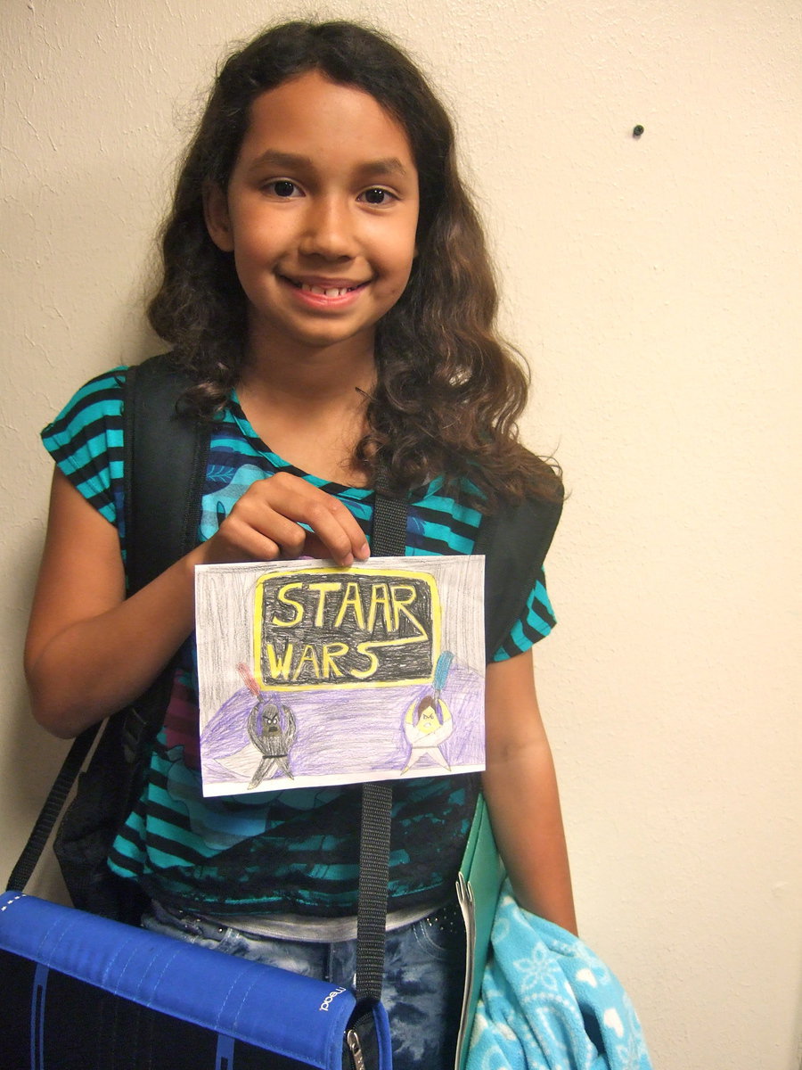 Image: Karman Lawson with her STAAR Wars art design.