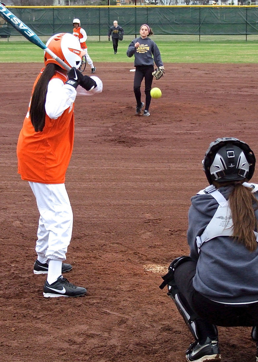 Image: JV pitcher Cassidy Childers brings the heat during a chilly outing against Avalon.