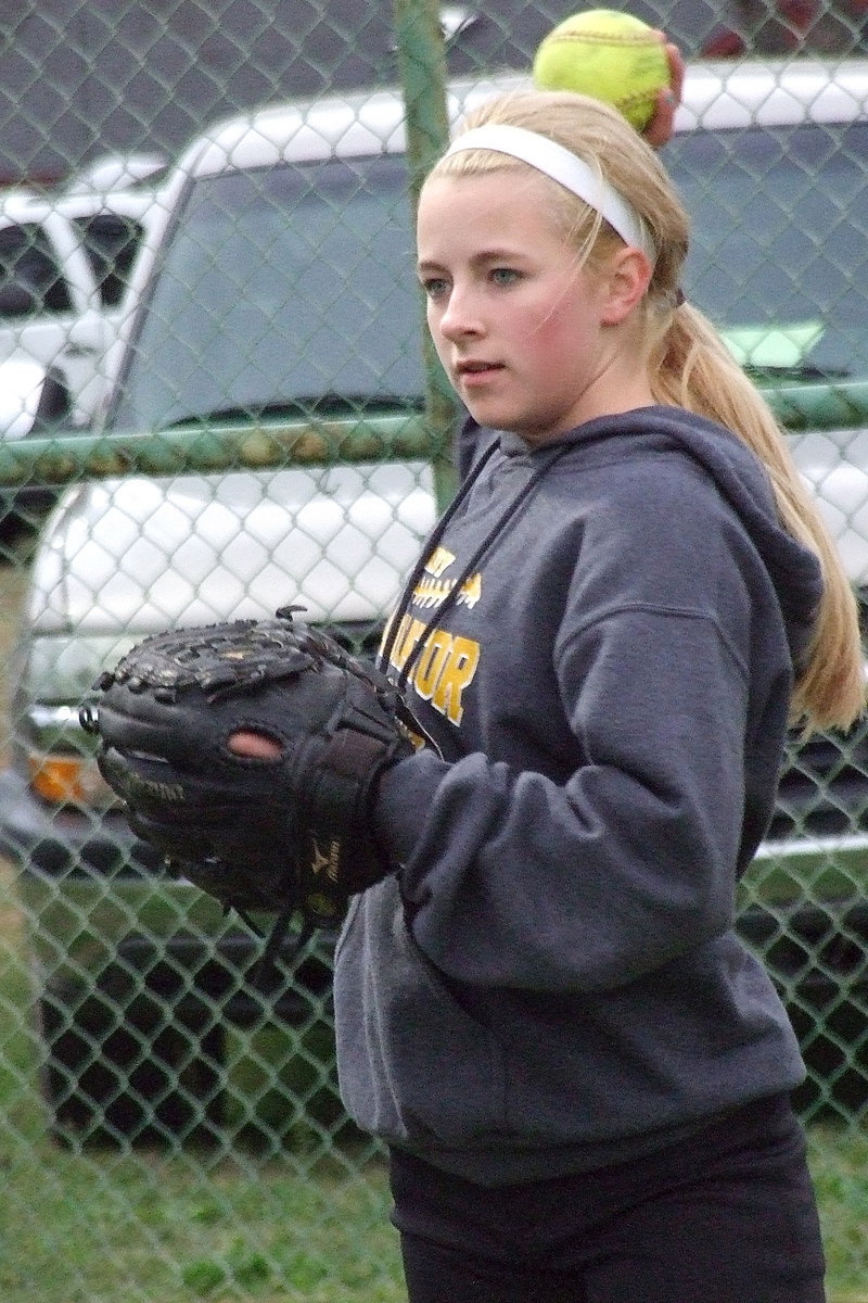 Image: Britney Chambers gets warmed up before the game.