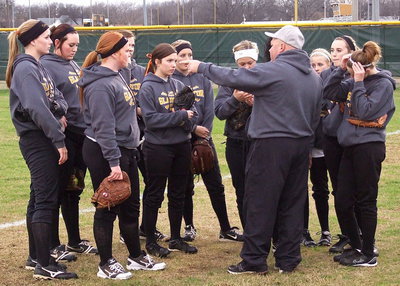 Image: Head Coach Wayne Rowe directs the squad before taking the field.