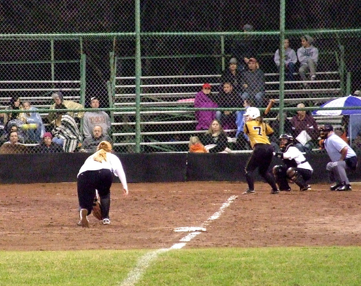 Image: Third baseman Katie Byers(13) stalks the Jaguars from third base.