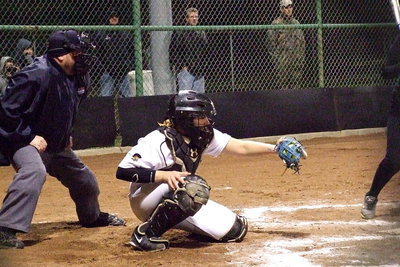Image: Lady Gladiator catcher Alyssa Richards(9) pulls in a strike from pitcher Jaclynn Lewis.