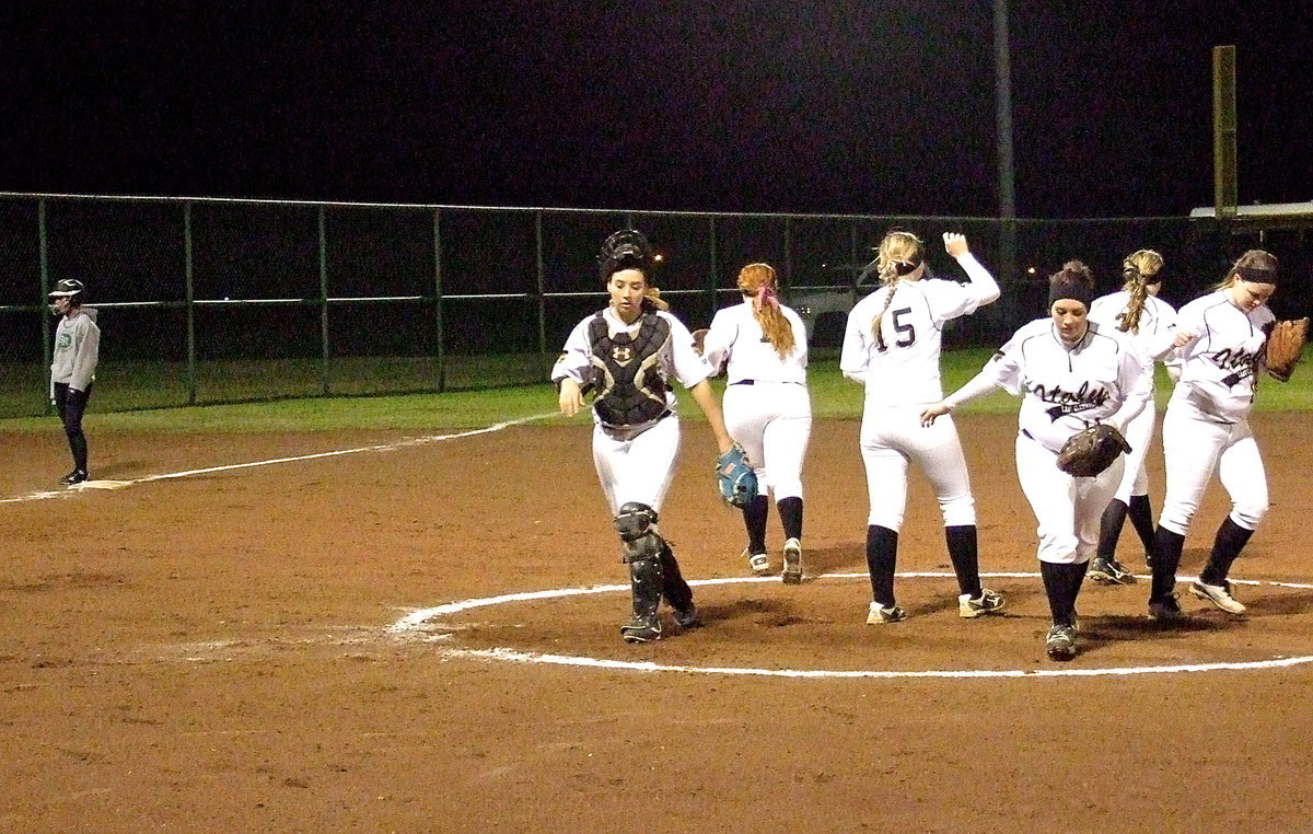 Image: Italy’s infield breaks after a meeting of the minds.