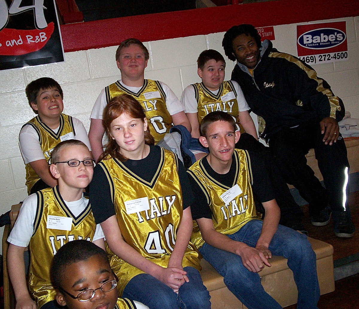 Image: Italy ISDs Special Olympic team waits patiently in the bleachers for their names to be called and their moment to compete. Athletes pictured are: (Top) Mikey South, Danny Ashley, Wyatt Ballard and Coach Erskin Anavitarte. (Middle) Charlie Bolin, Katie Connor and Nathan Brock. (Bottom) David Williams.