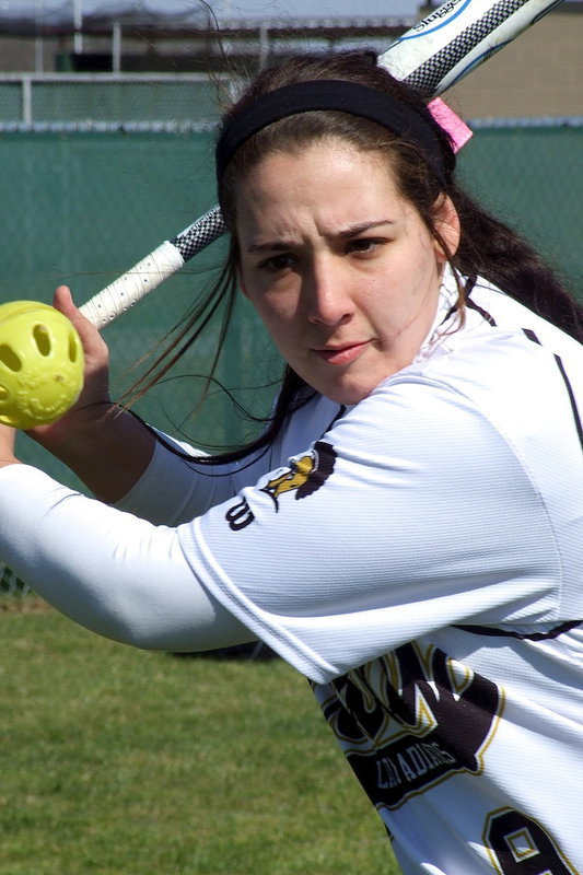 Image: This whiffle ball does not have a chance as Lady Gladiator Alyssa Richards(9) apparently hates whiffle balls.