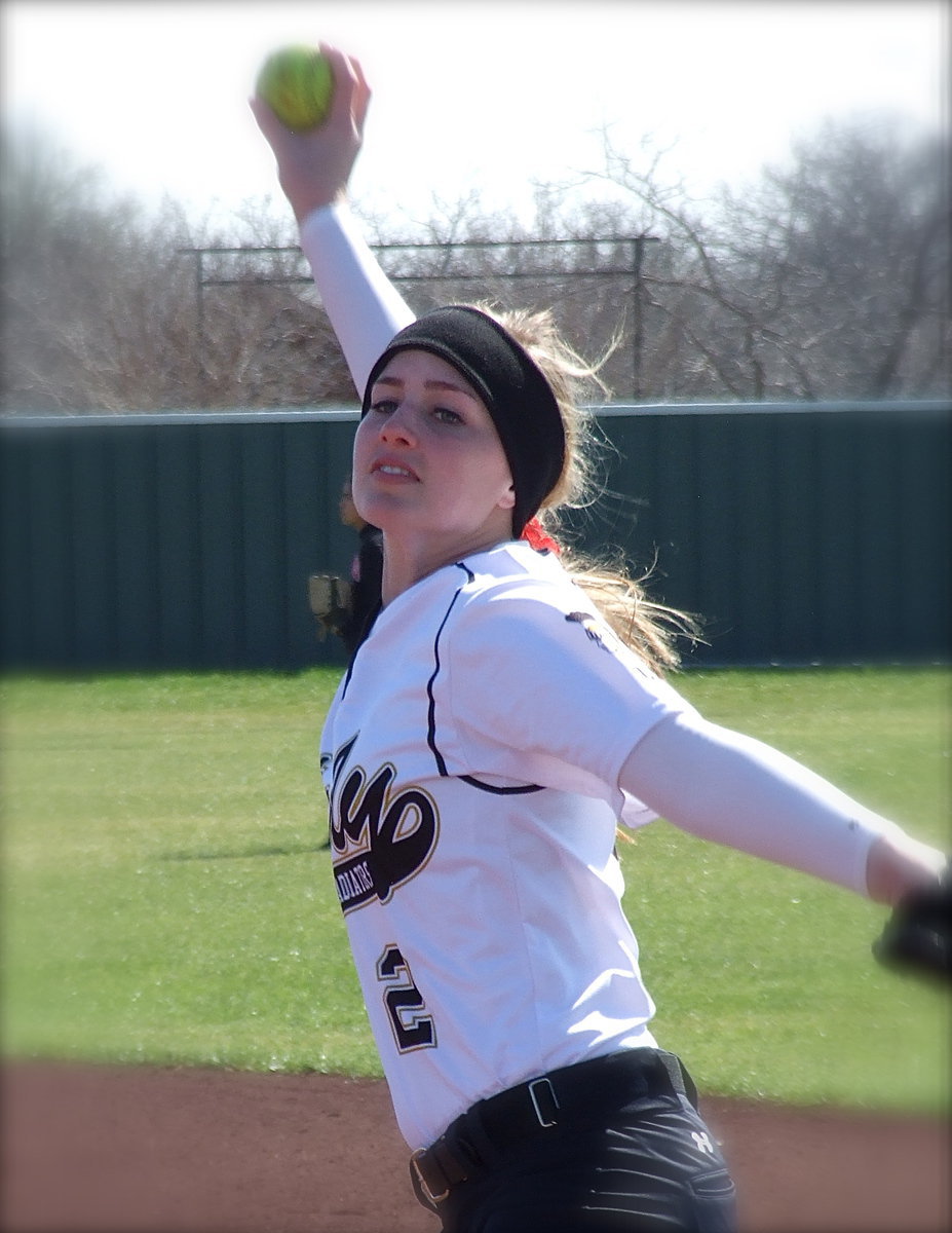 Image: Madison Washington(2) gives Italy a one, two punch off the mound.