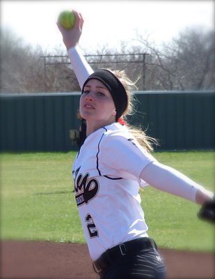 Image: Madison Washington(2) gives Italy a one, two punch off the mound.