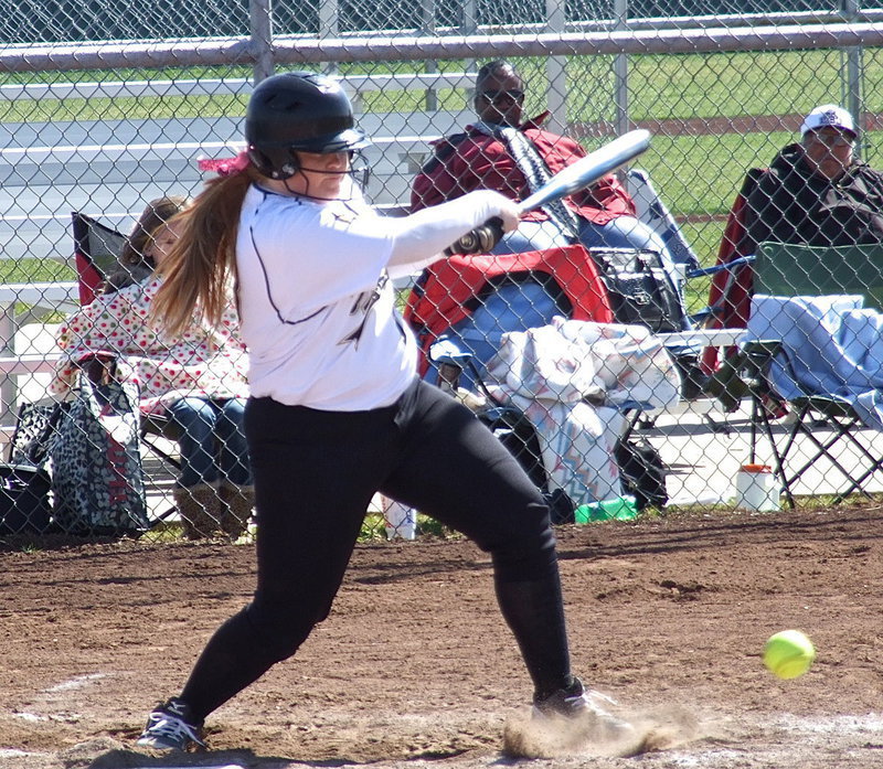 Image: Katie Byers singles to get on base.