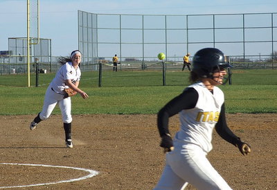 Image: Lady Gladiator shortstop Paige Westbrook(10) guns down an Itasca runner.