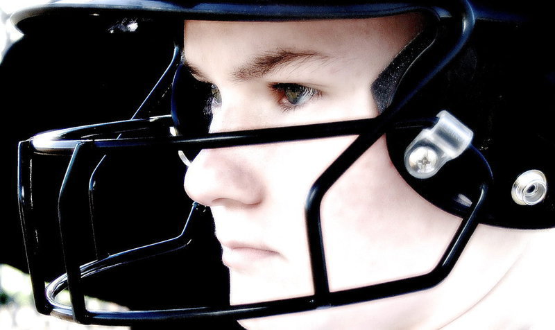 Image: Lady Gladiator Tara Wallis(5) shows intensity, and this is just in the dugout.