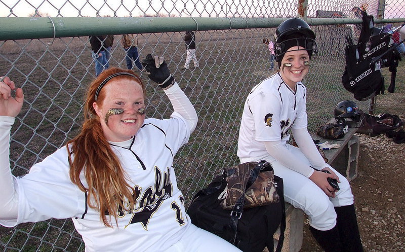 Image: Katie Byers(13) and Jaclynn Lewis(15) are just chilling before going to bat.