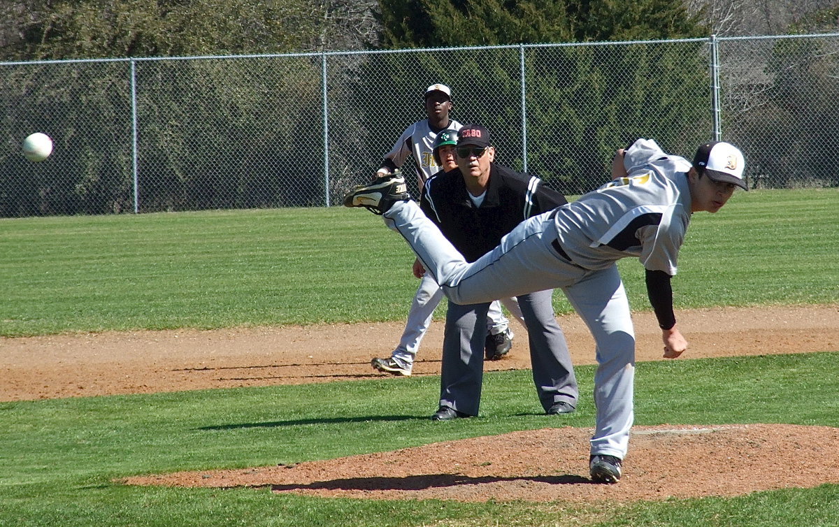 Image: Reid Jacinto(5) takes the mound for Italy against Kerens.