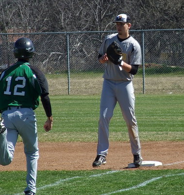 Image: First baseman Cole Hopkins makes the catch for an Italy out.