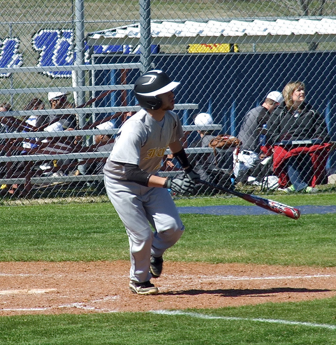Image: Italy’s Caden Jacinto(2) sends it deep into the outfield.