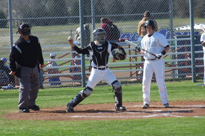 Image: Reid Jacinto(5) puts in a few innings as catcher for Italy.