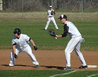 Image: Italy’s Cole Hopkins(9) dares a Hubbard Jaguar to go for it.