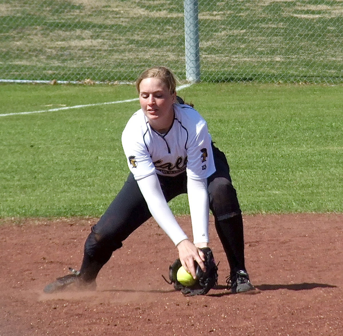Image: Madison Washington fields a grounder.