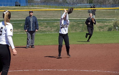 Image: Bailey Eubank(1) catches a popup for Italy with teammate Kelsey Nelson rushing in to backup the play.