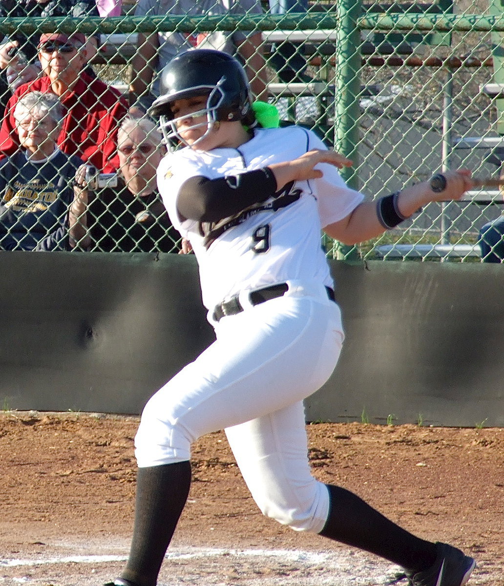 Image: Lady Gladiator Alyssa Richards(9) swings for the fences.