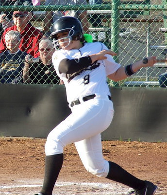 Image: Lady Gladiator Alyssa Richards(9) swings for the fences.