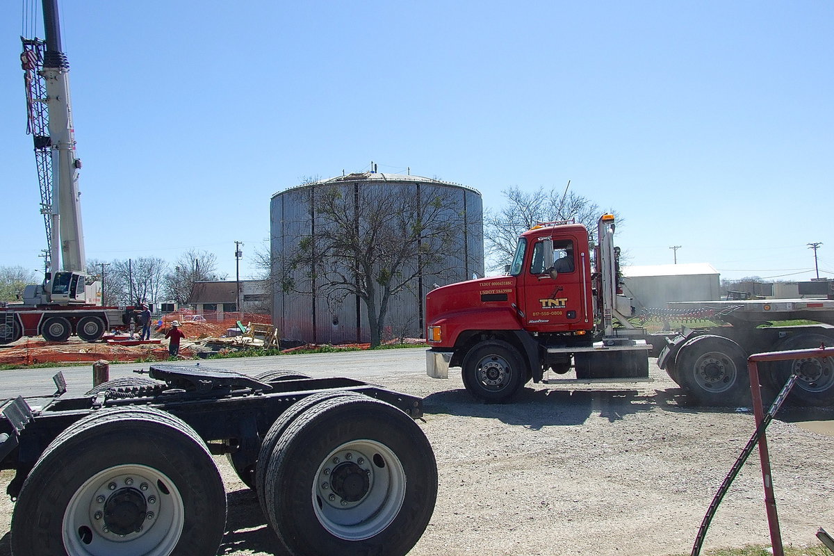 Image: The construction site hustles and bustles with heavy equipment to and from the location site where Highway 34/Main Street crosses Highway 77.