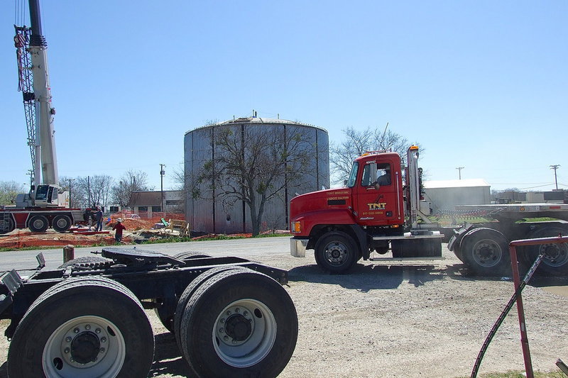 Image: The construction site hustles and bustles with heavy equipment to and from the location site where Highway 34/Main Street crosses Highway 77.