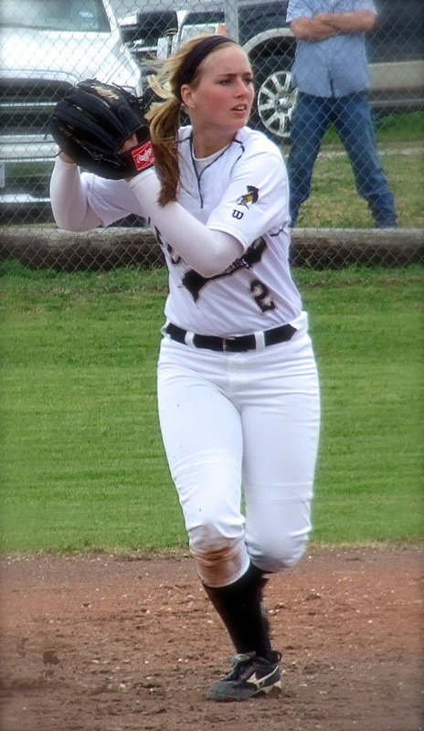 Image: Shortstop Madison Washington(2) is a wall on defense.