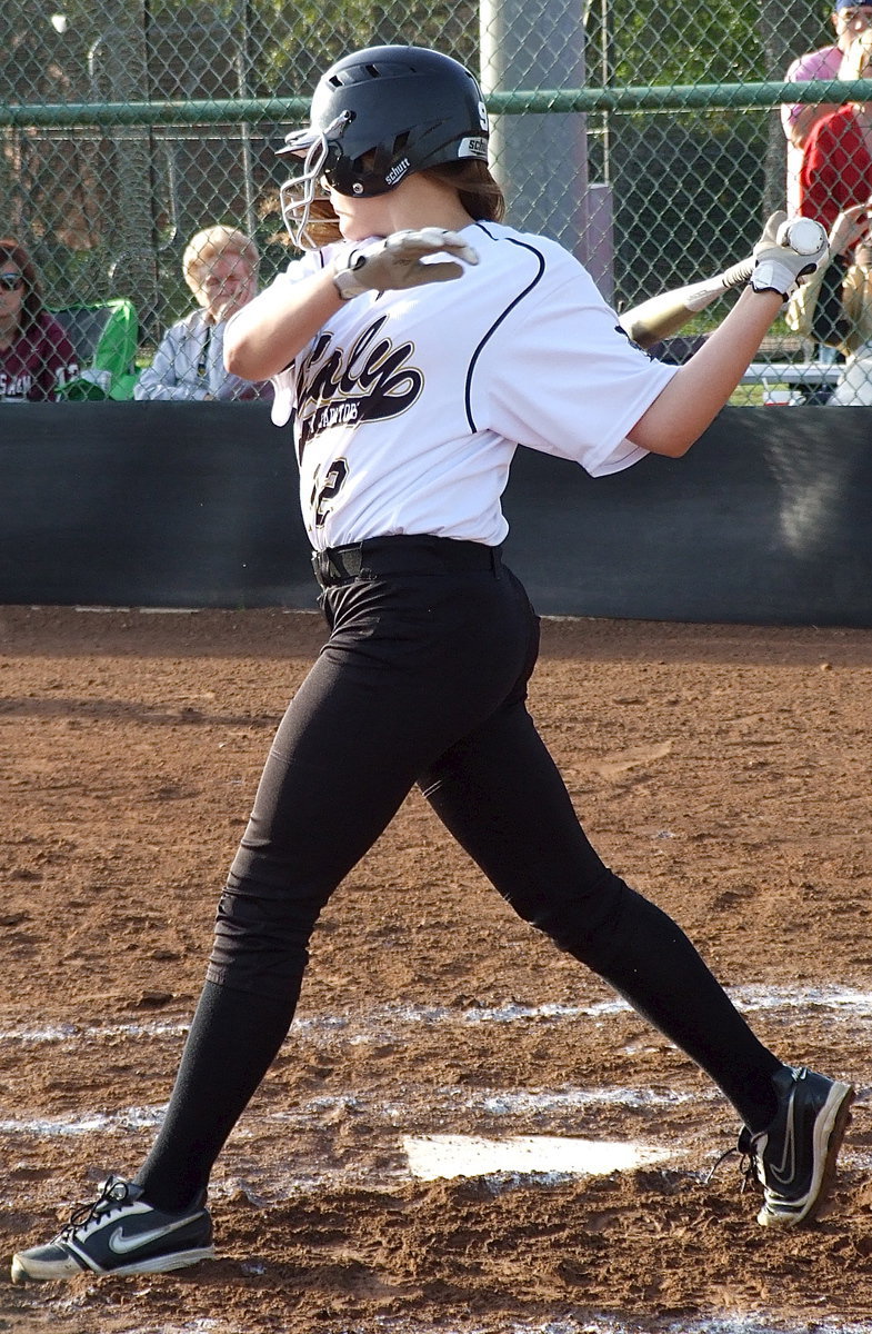 Image: Freshman Lillie Perry(12) battles her way to a walk.