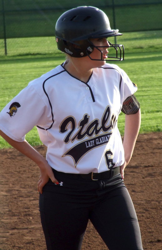 Image: Freshman Hannah Washington(6) looks to score from third base.