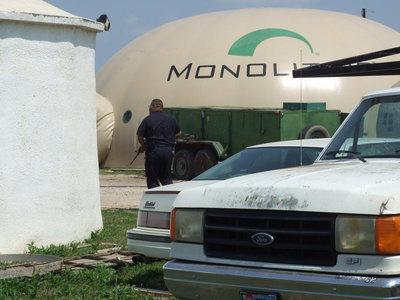 Image: The cocking of the rifle echoes between the massive dome structures as the police search dome-to-dome for a hidden suspect.