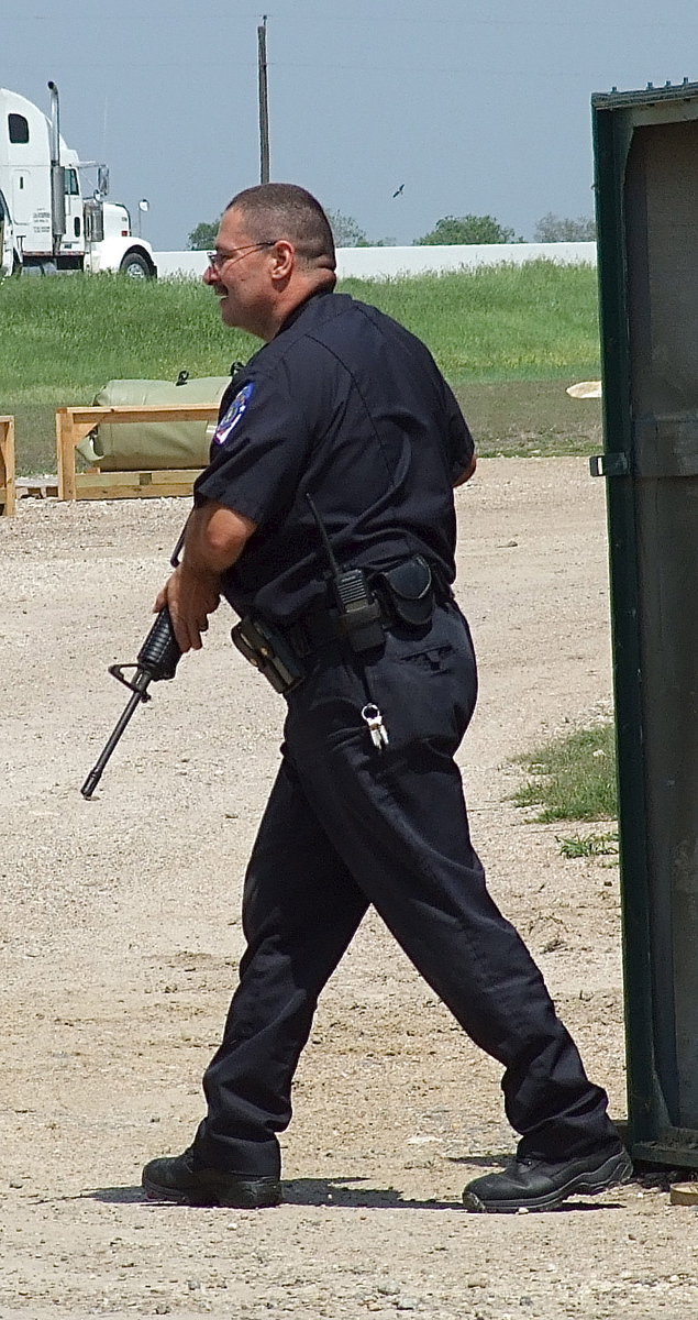 Image: Milford Police Chief Carlos Phoenix continues the search from one dome to the next.