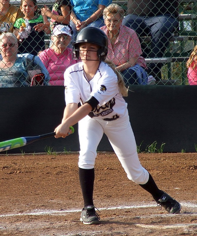 Image: Britney Chambers(4) slaps her way onto first base.