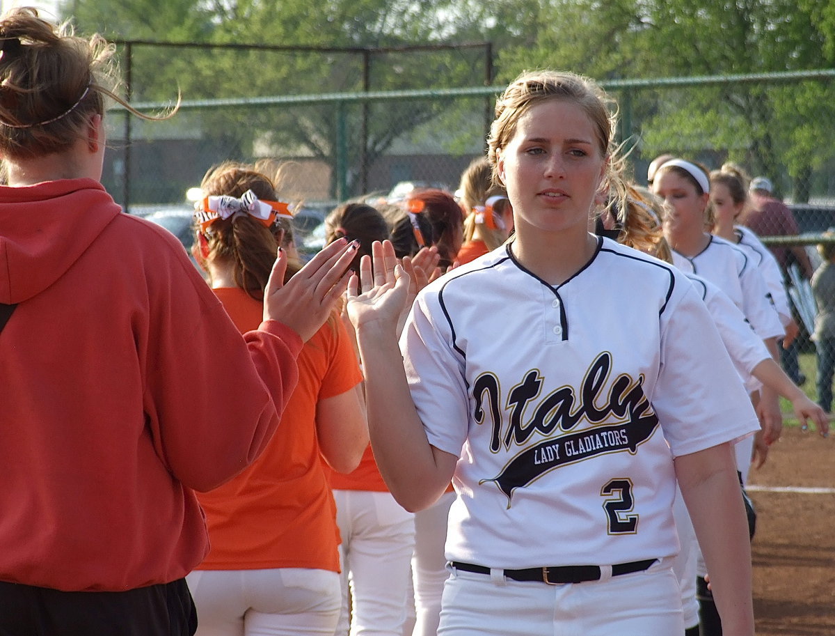 Image: Madison Washington(2) and her Lady Gladiator teammates congratulate Avalon for playing hard after the game.