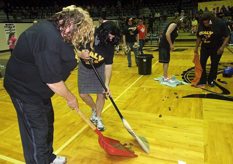 Image: The cheerleaders were also charged with drop duty, a job they handled with spirit and swiftness.