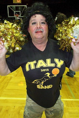 Image: Italy ISD School Board President/Cheerleader Larry “Legs” Eubank kicks up spirit during the donkey basketball games.