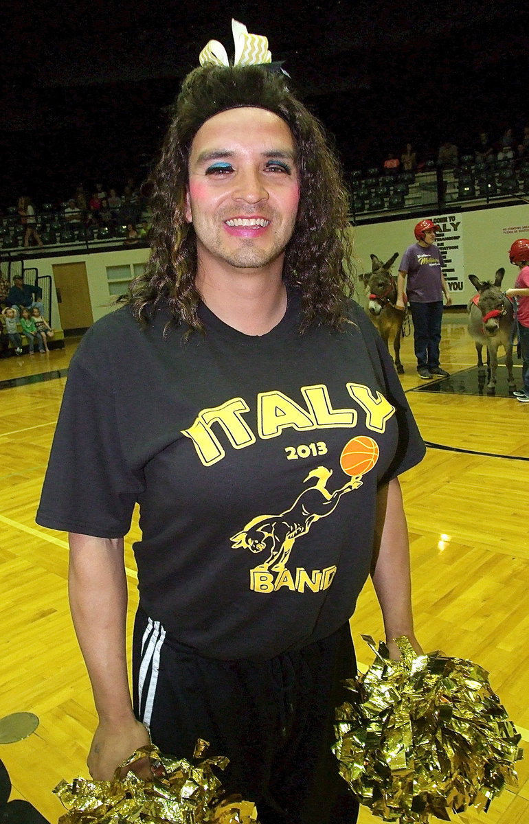 Image: Soon to be sworn in Italy ISD School Board member Sal “Smokin’” Ramirez jumps right in to take on one of his first challenges with his chest out and his hair pulled back.