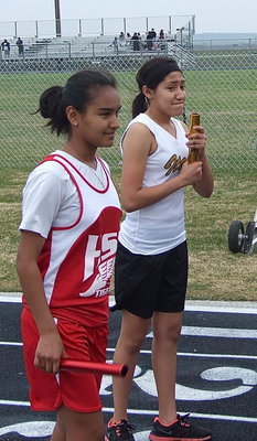 Image: Italy’s Marlen Hernandez, in the gold and white, tries to hold back her nerves before the race.