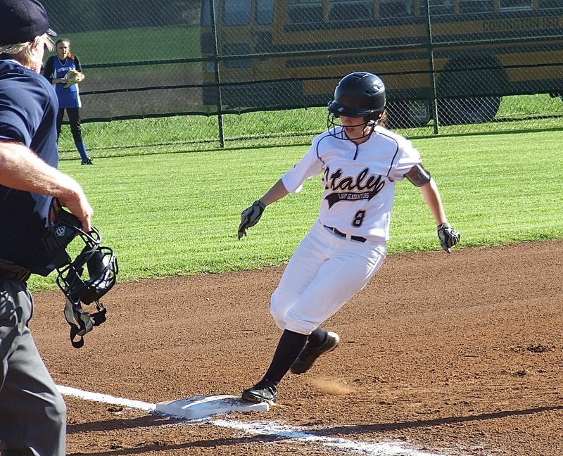 Image: Lady Gladiator senior Morgan Cockerham(8) touches third and then races home to help Italy defeat Covington during the first game of a double-header on Saturday.
