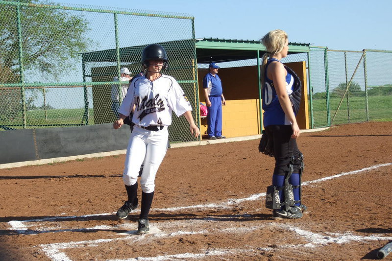Image: Freshman Lady Gladiator Britney Chambers(4) scores a run.