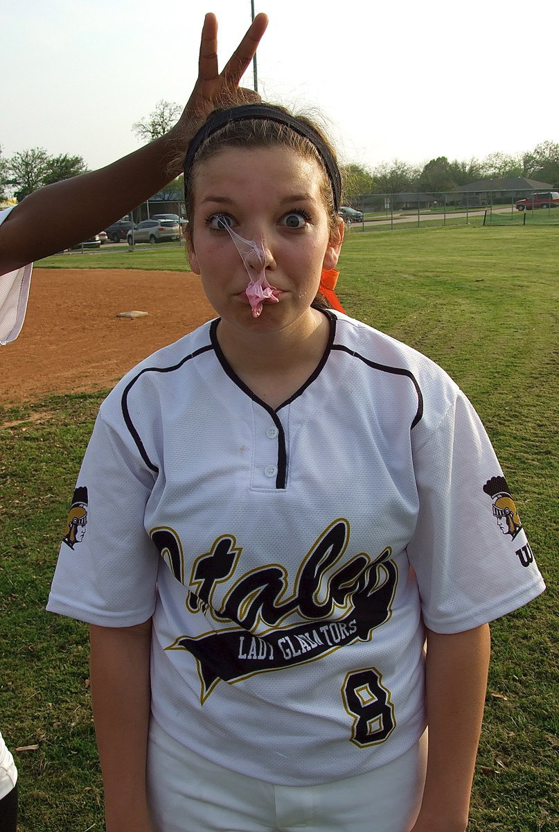 Image: Lady Gladiator senior Morgan Cockerham(8) and her Lady Gladiator teammates burst Faith Family’s bubble to win 24-3 and win the district title undefeated with a 12-0 record.