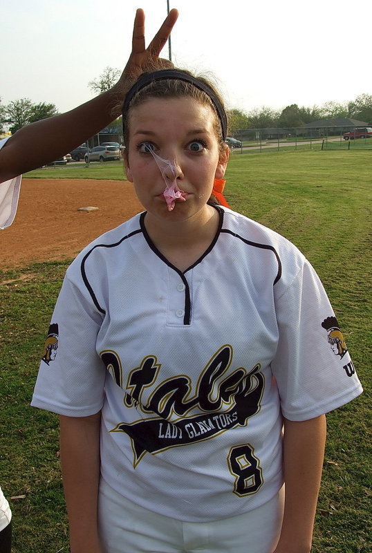 Image: Lady Gladiator senior Morgan Cockerham(8) and her Lady Gladiator teammates burst Faith Family’s bubble to win 24-3 and win the district title undefeated with a 12-0 record.