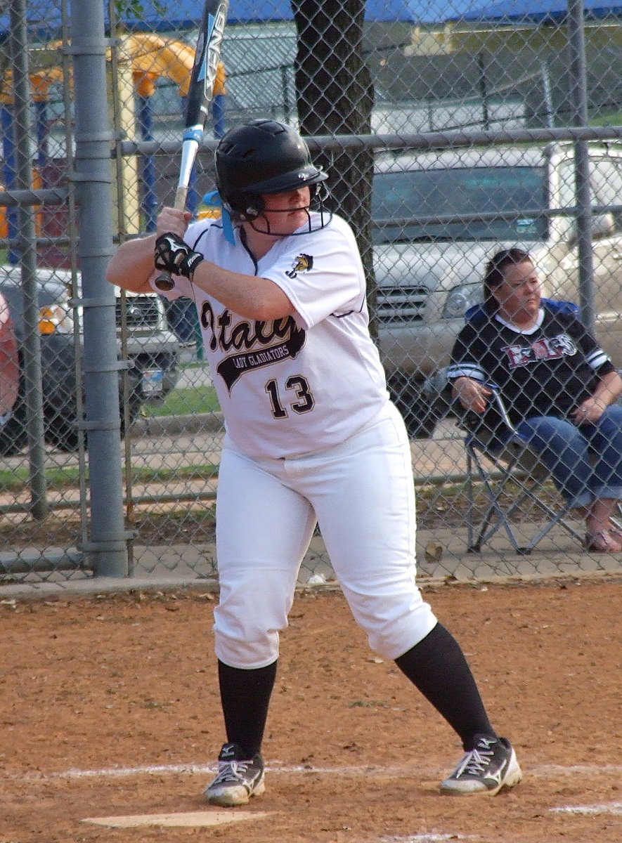Image: Katie Byers(13) hits a double as Italy racks up 15 runs during their first at bat…and could have been more.