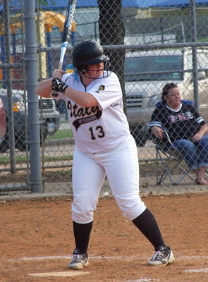 Image: Katie Byers(13) hits a double as Italy racks up 15 runs during their first at bat…and could have been more.