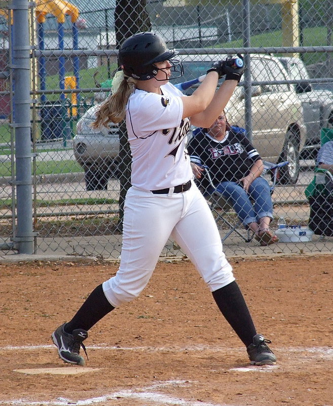 Image: Italy’s Jaclynn Lewis(15) connects for a double.