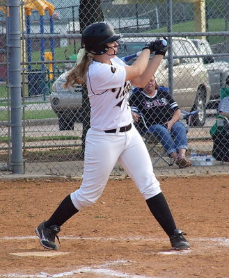 Image: Italy’s Jaclynn Lewis(15) connects for a double.