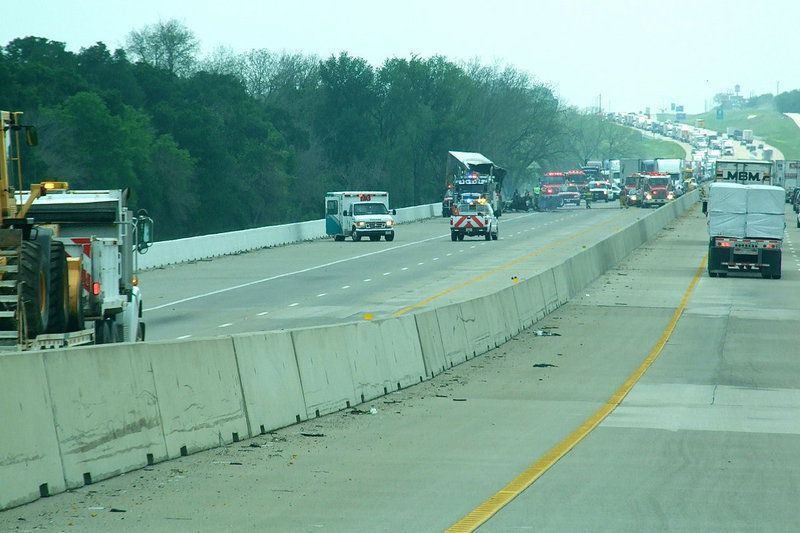 Image: Cleanup crews make their way to the scene as Italy, Avalon and Forreston Fire Departments control the blazing trailer.