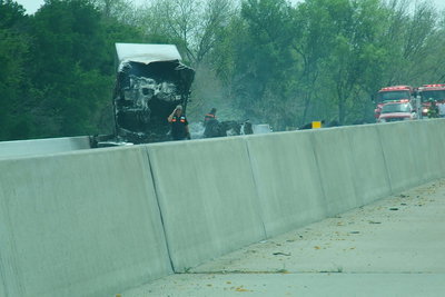 Image: The smoldering trailer is nearly ready to be hauled away.