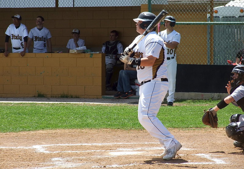 Image: Sophomore John Byers(18) turns heads with a fly ball.
